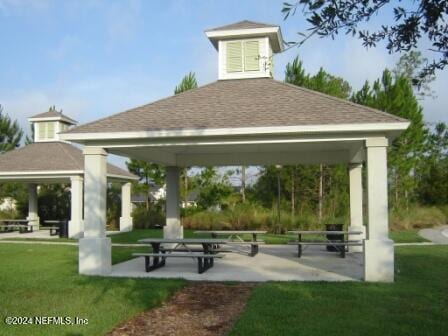 view of community featuring a gazebo and a lawn