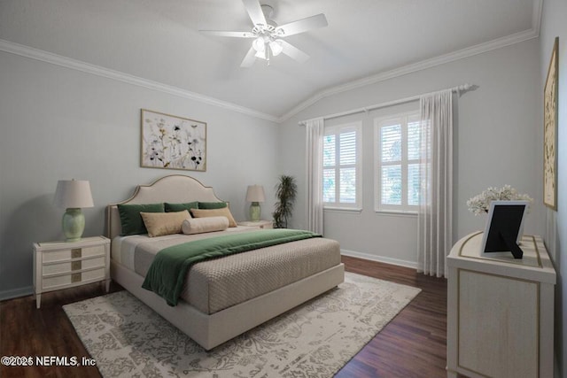 bedroom with crown molding, dark wood-type flooring, and vaulted ceiling