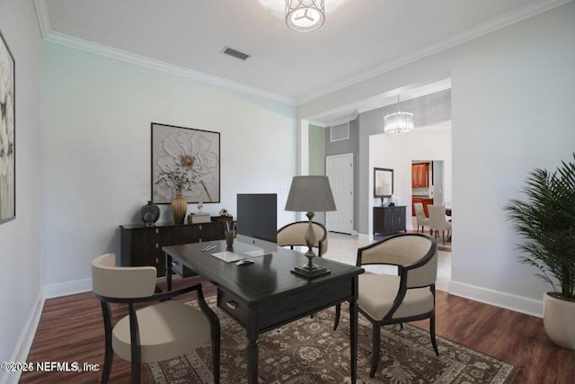 office with ornamental molding, an inviting chandelier, and dark hardwood / wood-style flooring