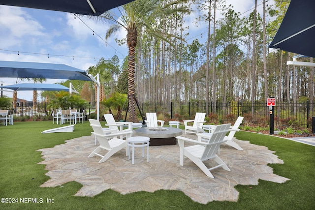 view of patio / terrace featuring a fire pit