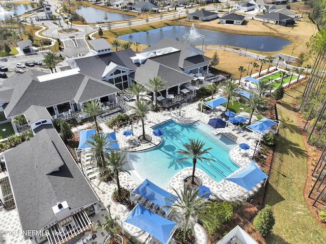 birds eye view of property featuring a water view