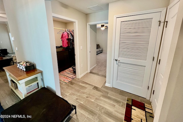 interior space featuring ceiling fan and hardwood / wood-style floors