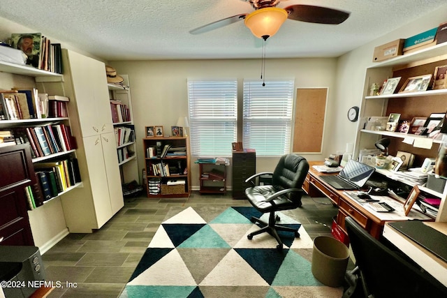 office area featuring a textured ceiling and ceiling fan