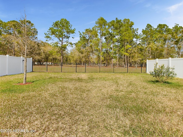 view of yard with fence