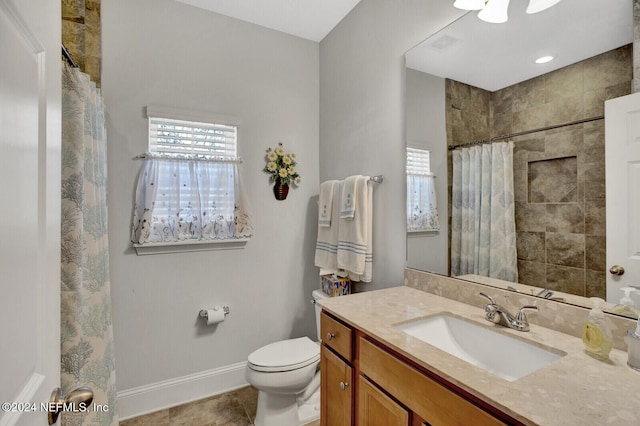 bathroom with vanity, a shower with shower curtain, toilet, and tile patterned floors