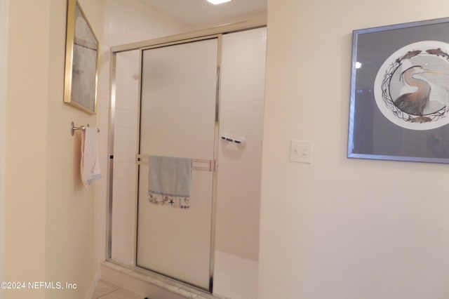 full bathroom with a stall shower