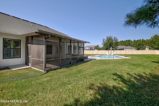 view of yard featuring a fenced in pool