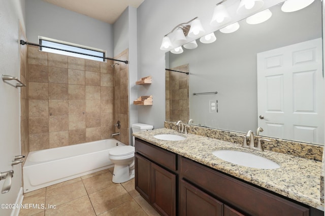 1309 Acorn Ridge Ct, Saint Augustine, FL 32092 - bathroom with a sink, washtub / shower combination, tile patterned floors, and toilet