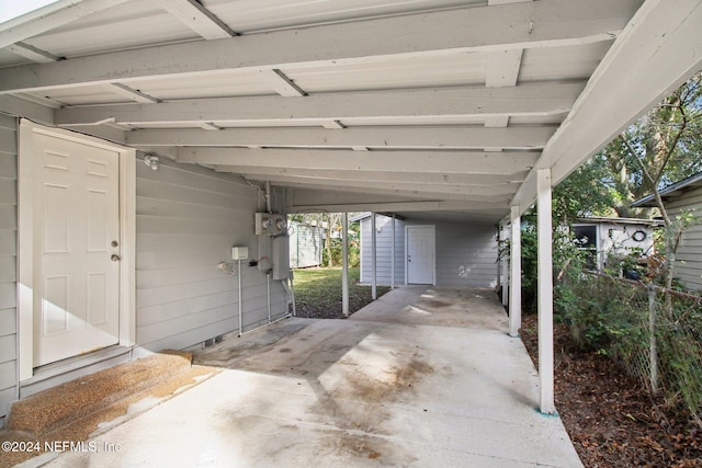 garage with a carport