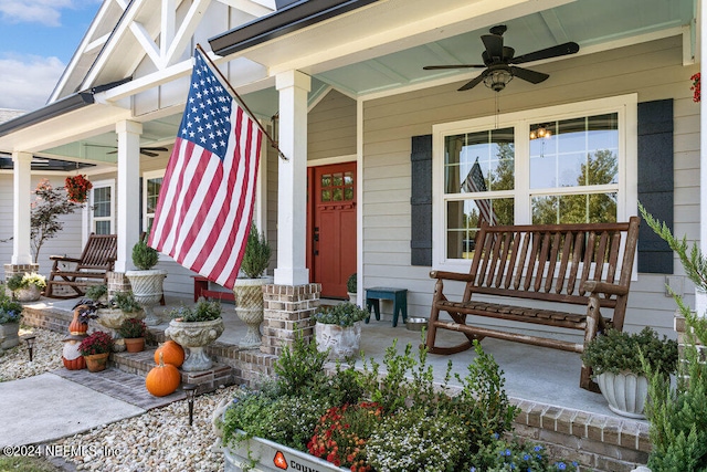 property entrance featuring covered porch and ceiling fan