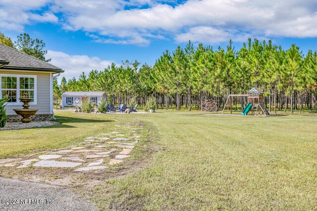 view of yard with a playground