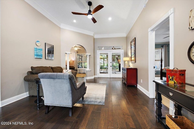 living room with ornamental molding, french doors, dark hardwood / wood-style floors, and a textured ceiling