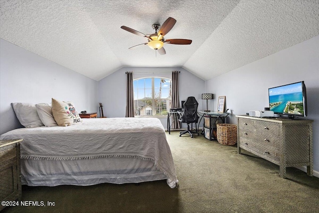 bedroom featuring a textured ceiling, vaulted ceiling, carpet floors, and ceiling fan