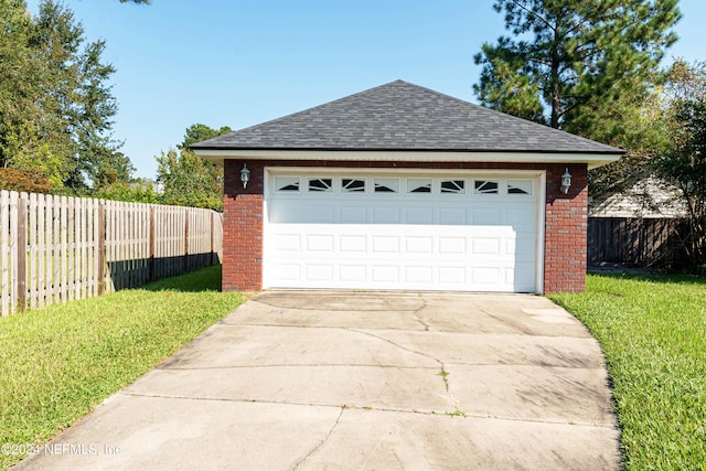 garage with a yard