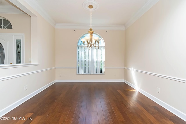 unfurnished dining area with crown molding, a notable chandelier, and dark hardwood / wood-style floors