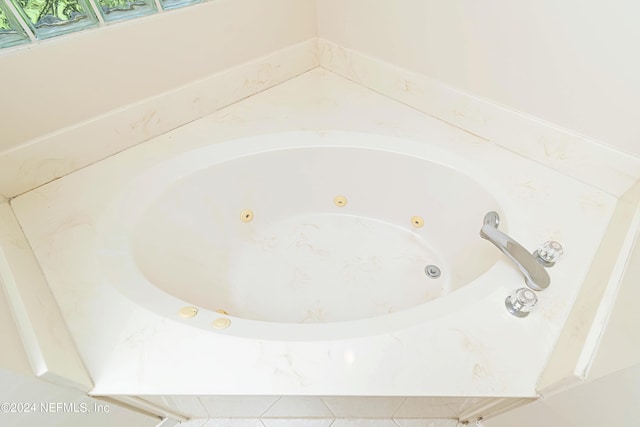 room details with a relaxing tiled tub