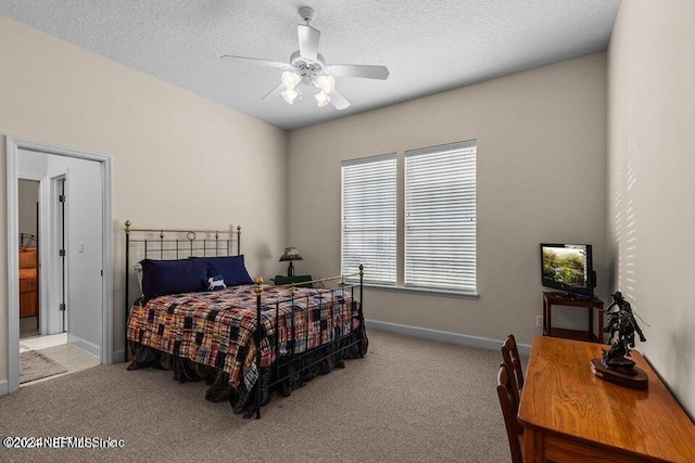 bedroom with light carpet, a textured ceiling, and ceiling fan