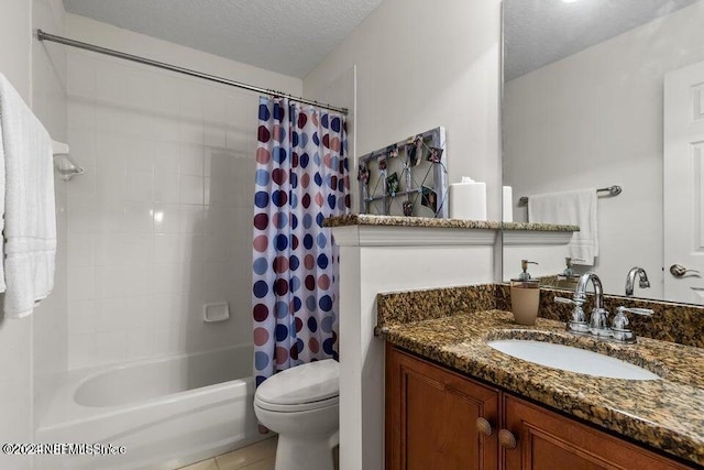 full bathroom with a textured ceiling, shower / bath combination with curtain, toilet, vanity, and tile patterned flooring