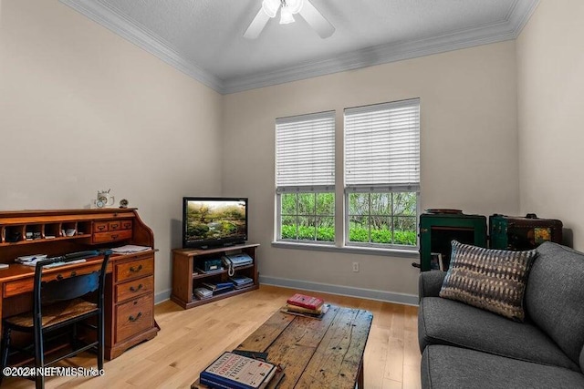 interior space with ornamental molding, light hardwood / wood-style floors, and ceiling fan