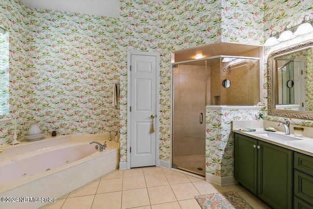 bathroom featuring vanity, shower with separate bathtub, and tile patterned flooring