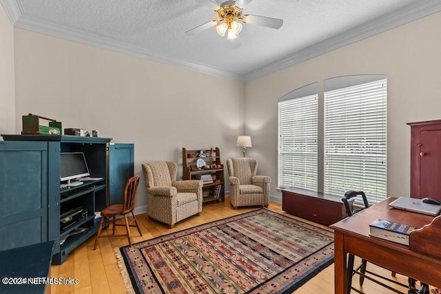 home office with crown molding, hardwood / wood-style flooring, a textured ceiling, and ceiling fan