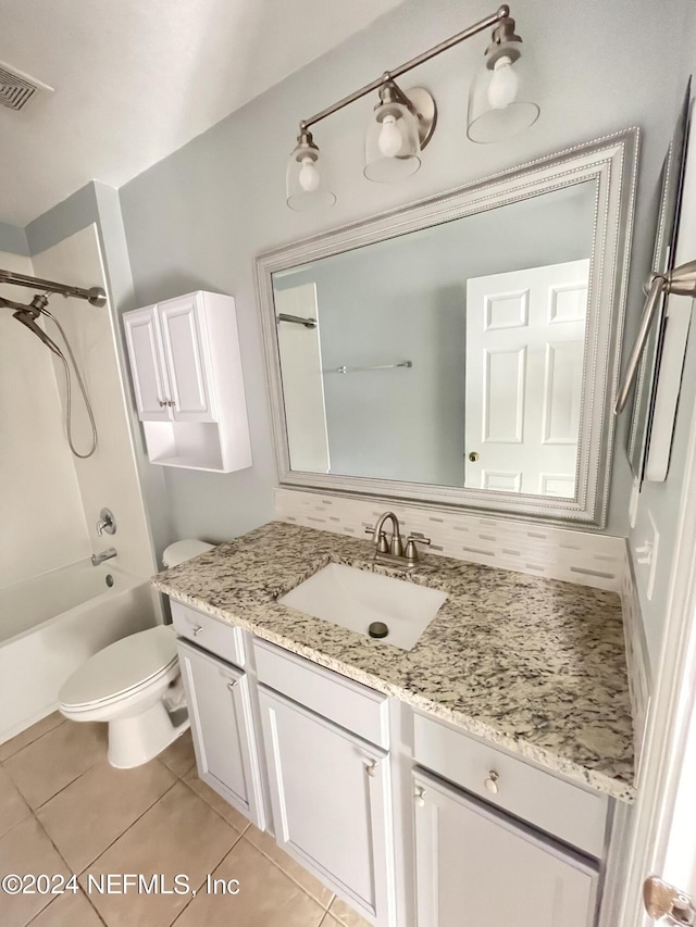 full bathroom featuring vanity, tile patterned floors, toilet, and shower / bathtub combination