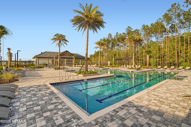 view of pool featuring a gazebo and a patio area