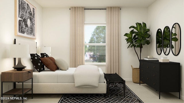 carpeted bedroom featuring baseboards