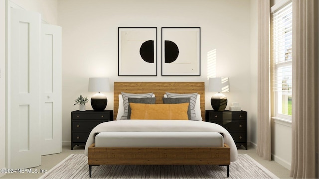 carpeted bedroom featuring baseboards