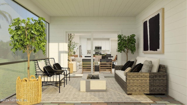 view of patio featuring an outdoor living space with a fire pit