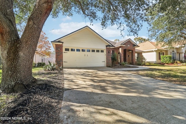 ranch-style home with a garage