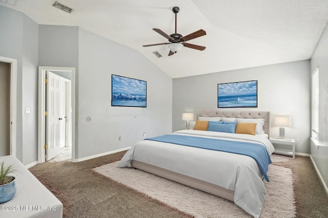 bedroom with ceiling fan, carpet flooring, vaulted ceiling, and multiple windows