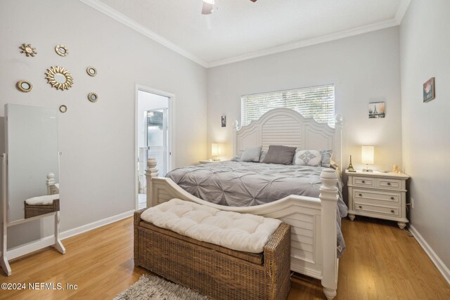 bedroom with ceiling fan, ornamental molding, connected bathroom, and light hardwood / wood-style flooring