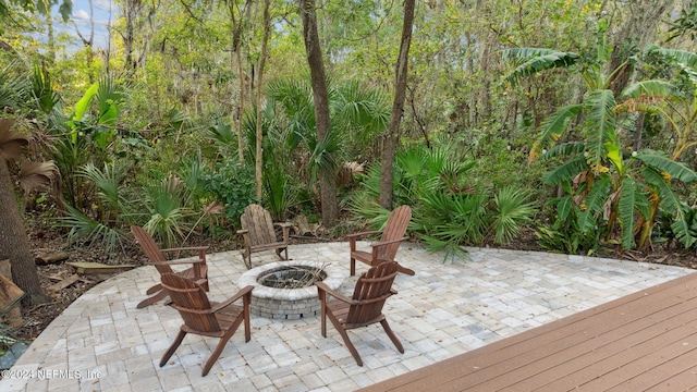 view of patio / terrace featuring an outdoor fire pit