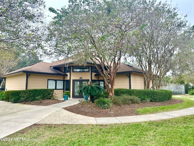 view of front of home with a front yard