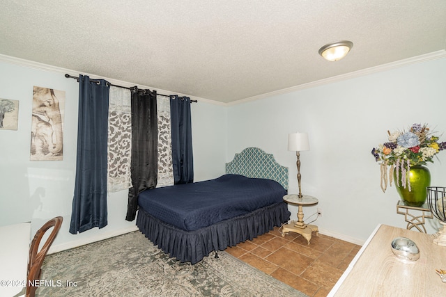 bedroom with ornamental molding and a textured ceiling