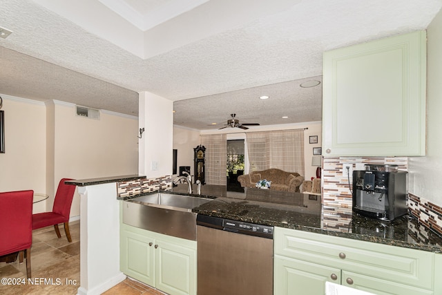 kitchen with dishwasher, kitchen peninsula, sink, a textured ceiling, and ceiling fan