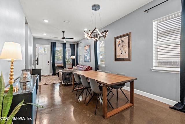 dining space featuring ceiling fan