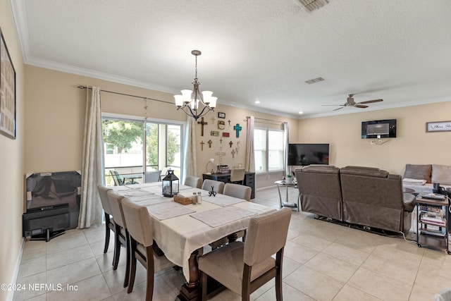 dining space featuring crown molding, a textured ceiling, ceiling fan with notable chandelier, and light tile patterned floors