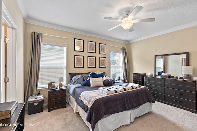 bedroom with light carpet, crown molding, a textured ceiling, and ceiling fan