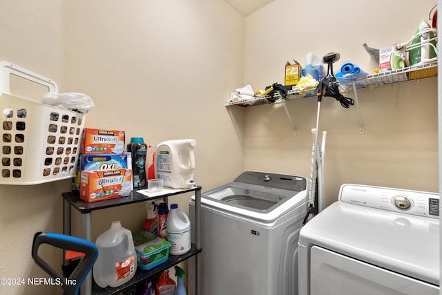 laundry room featuring washing machine and dryer