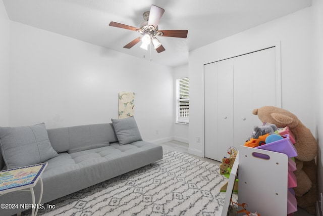 living room featuring ceiling fan