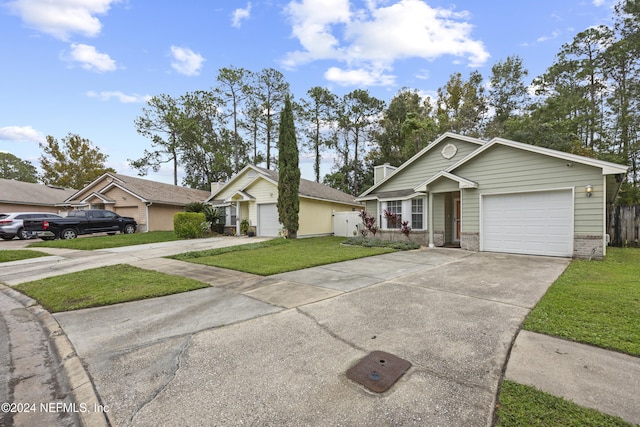 single story home with a front lawn