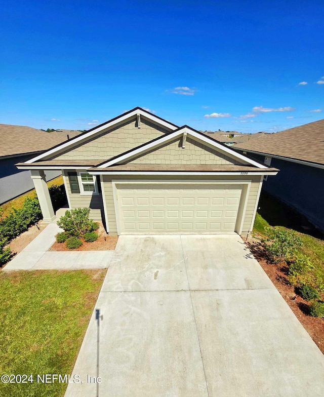 ranch-style home with a garage