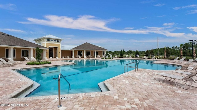 view of pool featuring a patio area