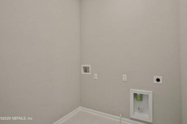 clothes washing area featuring hookup for a washing machine, baseboards, laundry area, and electric dryer hookup