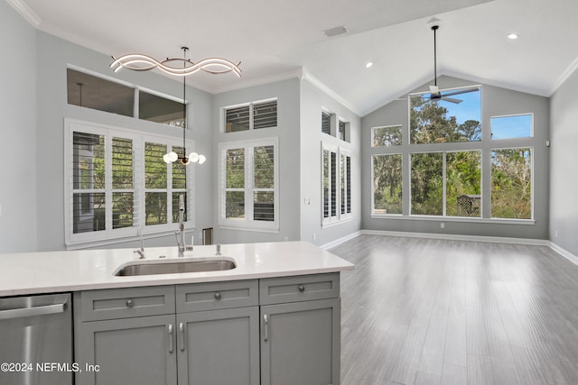 bathroom featuring vanity, crown molding, and vaulted ceiling