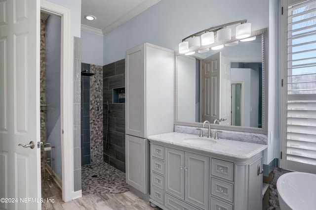 bathroom featuring vanity, crown molding, hardwood / wood-style floors, and separate shower and tub