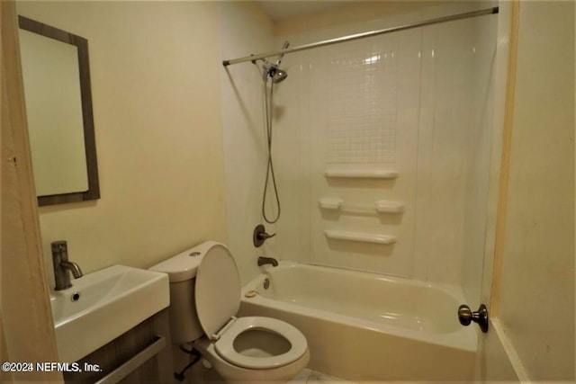 full bathroom with vanity, toilet, and shower / washtub combination