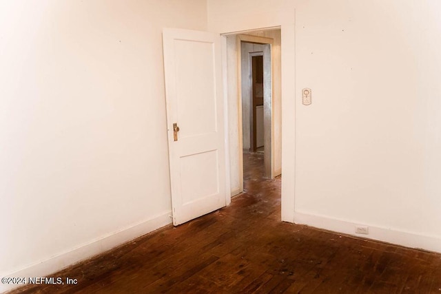 762 N Walnut St, Starke, FL 32091 - empty room featuring baseboards and hardwood / wood-style floors